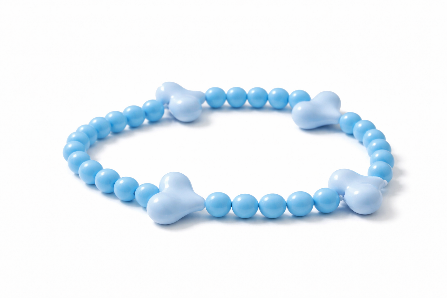 Blue beaded bracelet on a white background