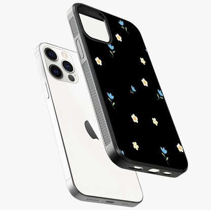Minimalistic Blue With White Flower Pattern Glass Case laid diagonally highlighting side profile, edges and glossy glass shine.