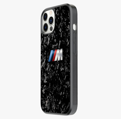 Carbon Speed Mark Glass Case photographed in natural light showing reflective finish and design depth.