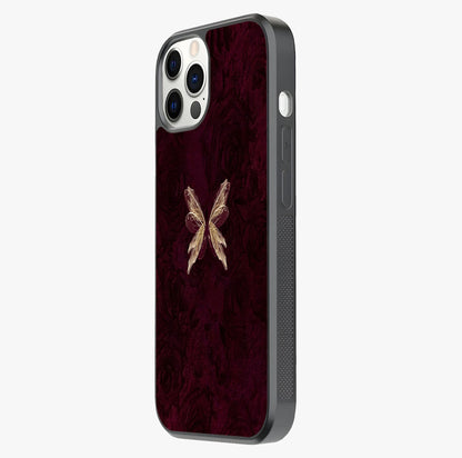 Crimson Fade Butterfly Glass Case photographed in natural light showing reflective finish and design depth.