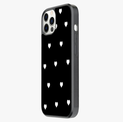 Cute And Simple White Hearts Glass Case photographed in natural light showing reflective finish and design depth.