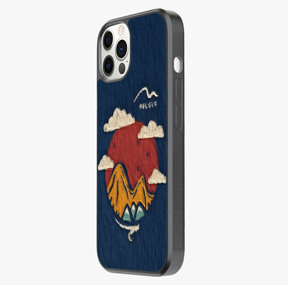 Dream Beyond Mountains Glass Case photographed in natural light showing reflective finish and design depth.