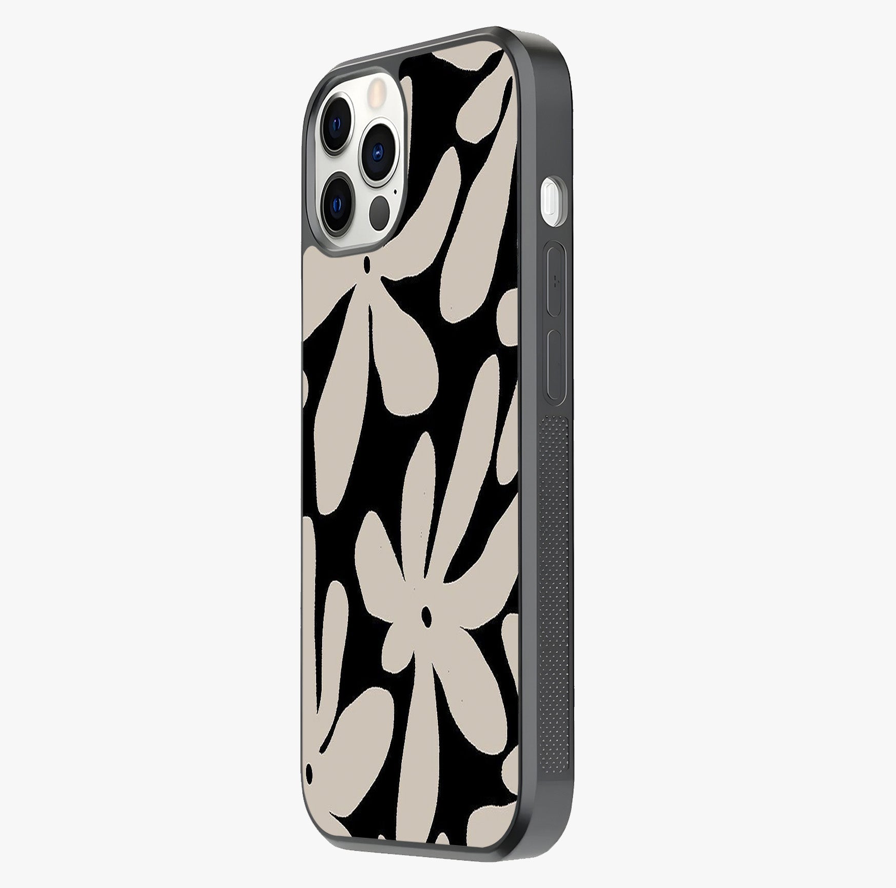 Monochrome Petal Dance Glass Case photographed in natural light showing reflective finish and design depth.