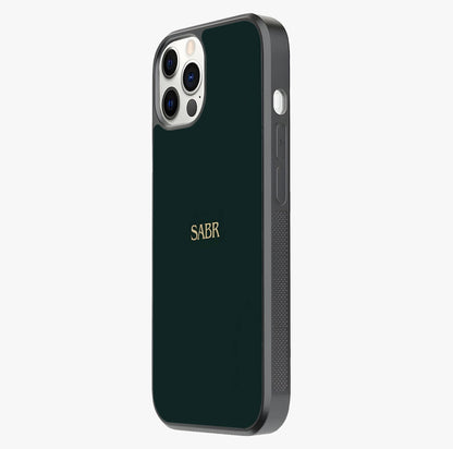 Sabr Minimal Patience Glass Case photographed in natural light showing reflective finish and design depth.