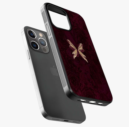 Crimson Fade Butterfly Glass Case laid diagonally highlighting side profile, edges and glossy glass shine.