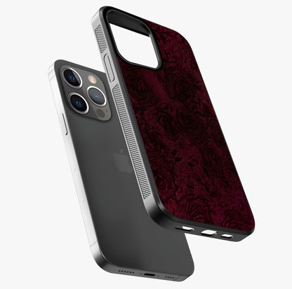 Crimson Fade Flow Glass Case laid diagonally highlighting side profile, edges and glossy glass shine.