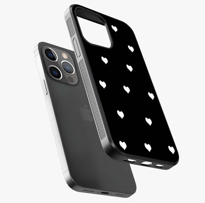 Cute And Simple White Hearts Glass Case laid diagonally highlighting side profile, edges and glossy glass shine.