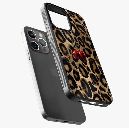 Leopard Wild Cherry Glass Case laid diagonally highlighting side profile, edges and glossy glass shine.
