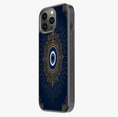 Golden Evil Eye Mandala Glass Case photographed in natural light showing reflective finish and design depth.