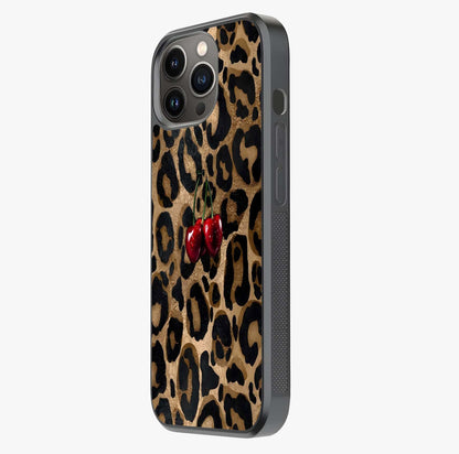 Leopard Wild Cherry Glass Case photographed in natural light showing reflective finish and design depth.