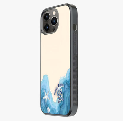 Ocean Drift Turtle Glass Case photographed in natural light showing reflective finish and design depth.