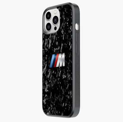 Carbon Speed Mark Glass Case photographed in natural light showing reflective finish and design depth.