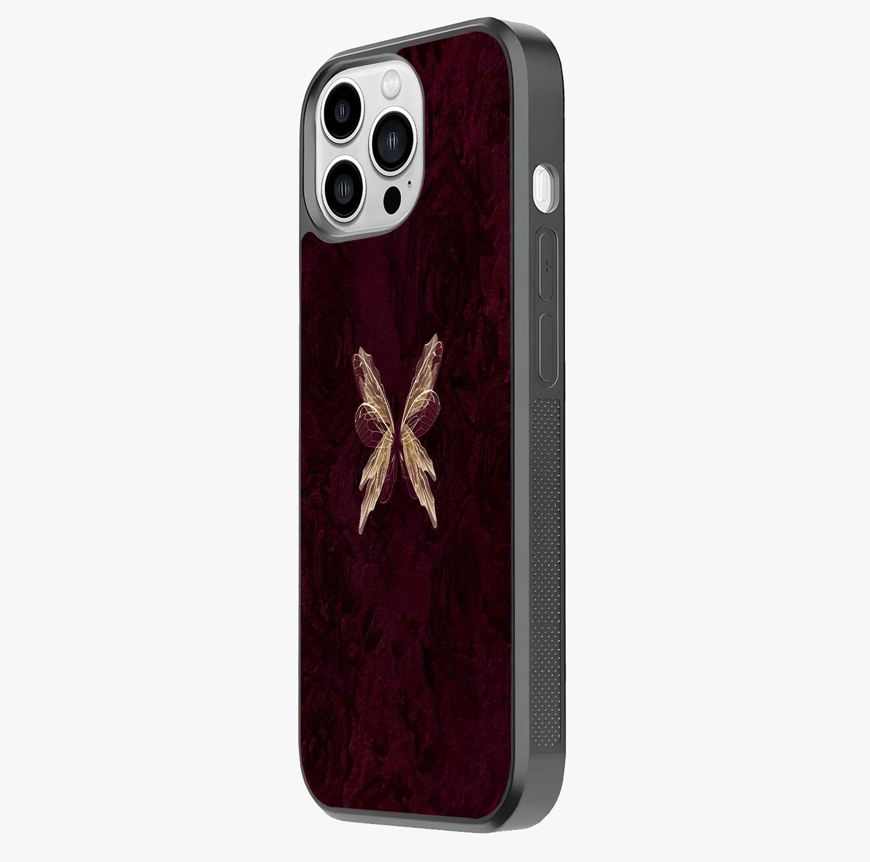 Crimson Fade Butterfly Glass Case photographed in natural light showing reflective finish and design depth.