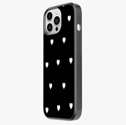 Cute And Simple White Hearts Glass Case photographed in natural light showing reflective finish and design depth.
