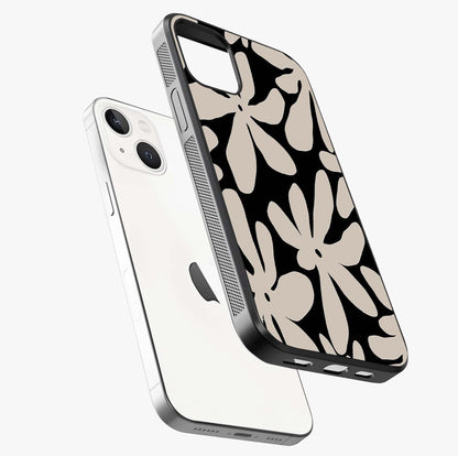 Monochrome Petal Dance Glass Case laid diagonally highlighting side profile, edges and glossy glass shine.