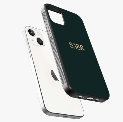 Sabr Minimal Patience Glass Case laid diagonally highlighting side profile, edges and glossy glass shine.