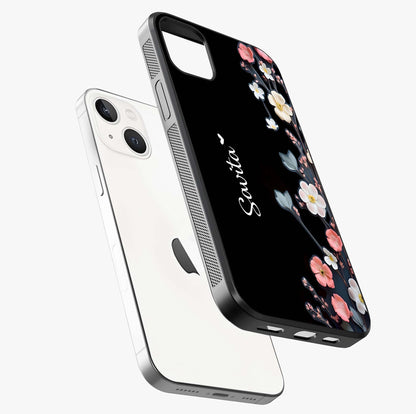 Black Elegance Floral Custom Name Glass Case laid diagonally highlighting side profile, edges and glossy glass shine.
