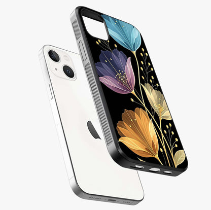 Delicate Multicolor Flowers Glass Case laid diagonally highlighting side profile, edges and glossy glass shine.