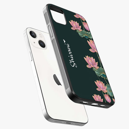 Lotus Bloom Serenity Custom Name Glass Case laid diagonally highlighting side profile, edges and glossy glass shine.
