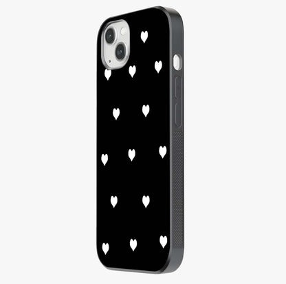 Cute And Simple White Hearts Glass Case photographed in natural light showing reflective finish and design depth.