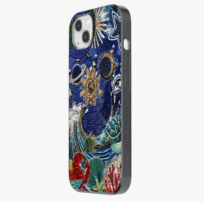 Universe Underwater Spark Glass Case photographed in natural light showing reflective finish and design depth.