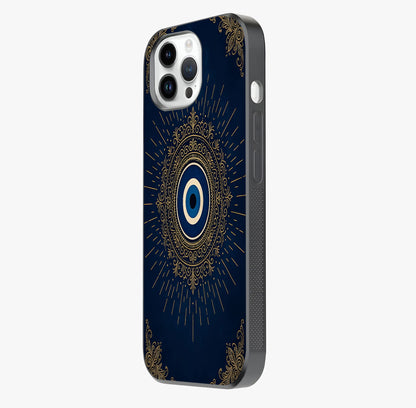 Golden Evil Eye Mandala Glass Case photographed in natural light showing reflective finish and design depth.