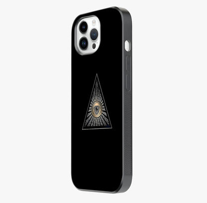 Illuminati Evil Glass Case photographed in natural light showing reflective finish and design depth.