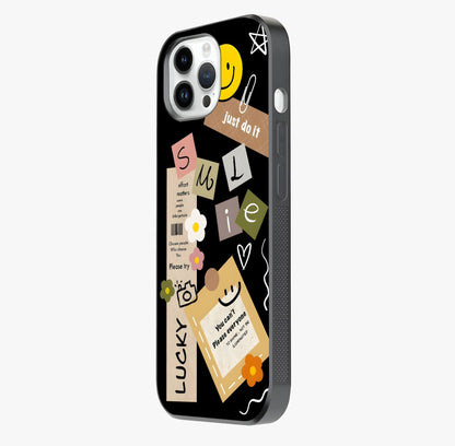 Lucky Aesthetic Collage Glass Case photographed in natural light showing reflective finish and design depth.