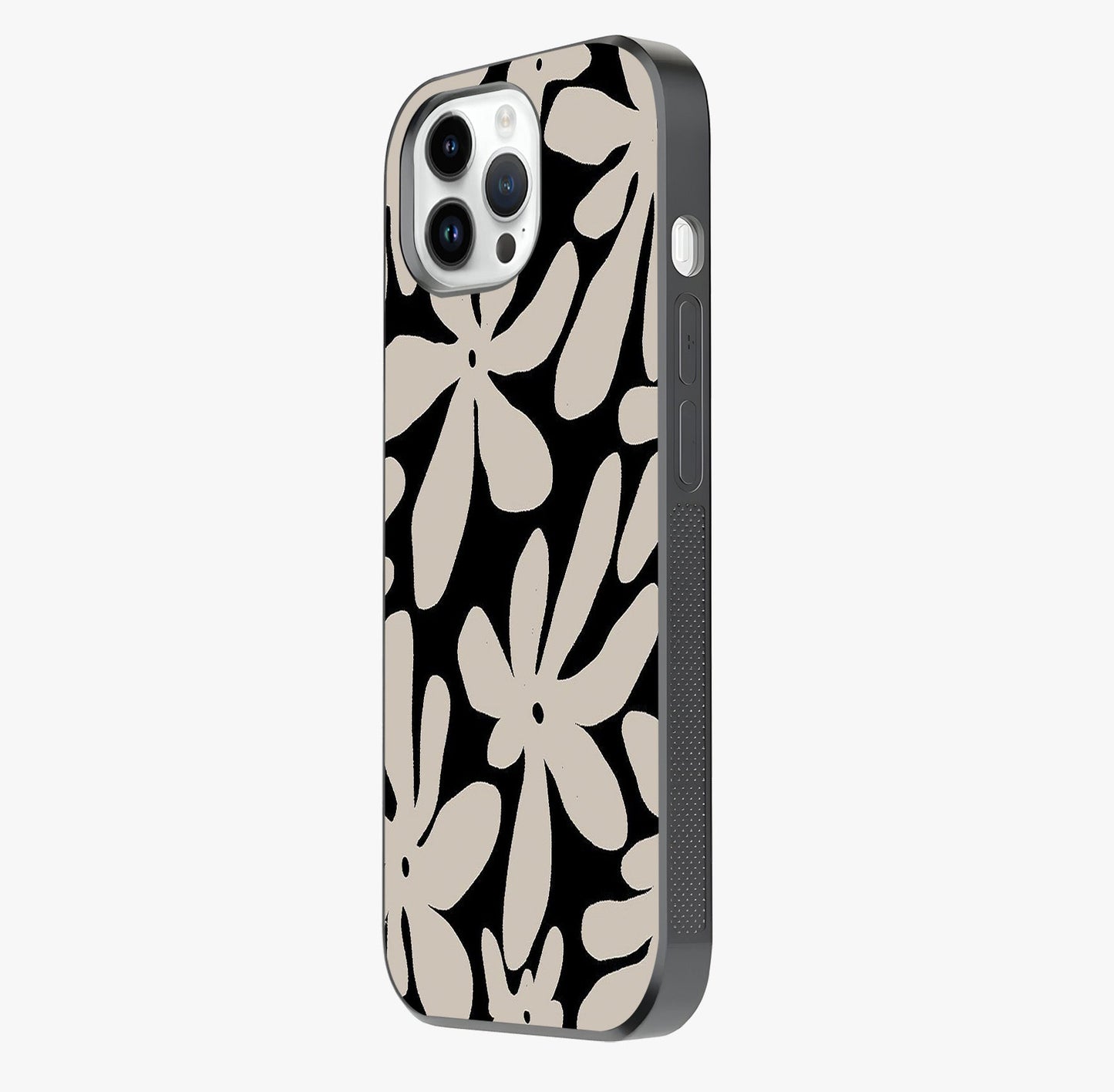 Monochrome Petal Dance Glass Case photographed in natural light showing reflective finish and design depth.