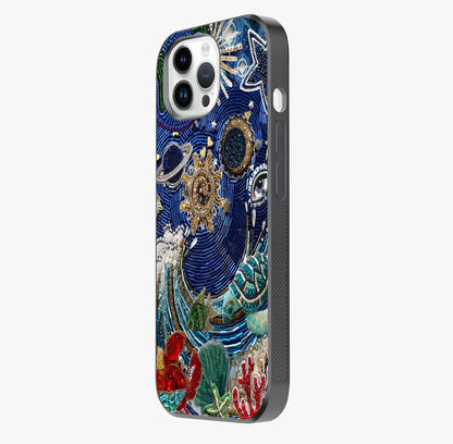 Universe Underwater Spark Glass Case photographed in natural light showing reflective finish and design depth.