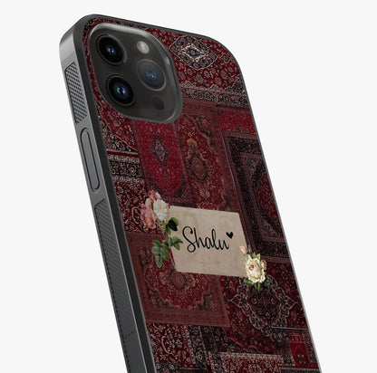 Velvet Wine Pattern Custom Name Glass Case captured at a warm angle highlighting gloss, texture and premium glass finish.