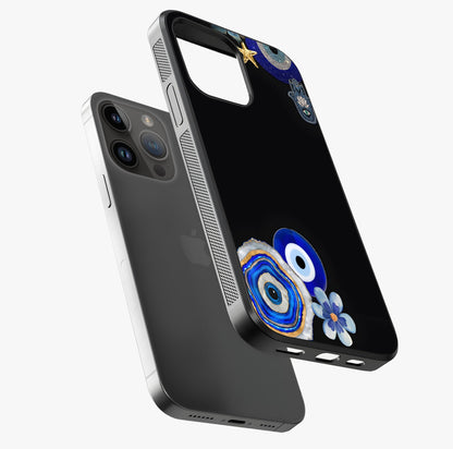 Aesthetic Blue Evil Eye Glass Case laid diagonally highlighting side profile, edges and glossy glass shine.