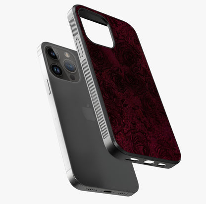 Crimson Fade Flow Glass Case laid diagonally highlighting side profile, edges and glossy glass shine.