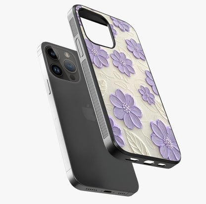 Floral Wall Art With Purple Flowers Glass Case laid diagonally highlighting side profile, edges and glossy glass shine.