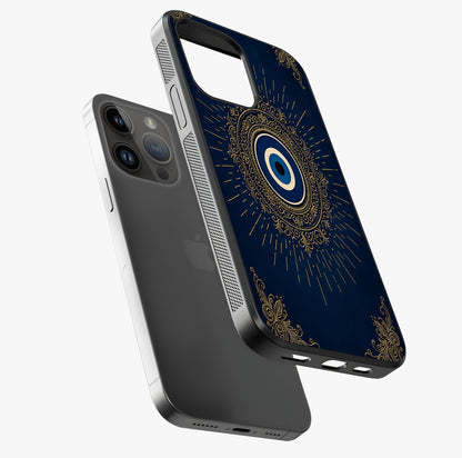 Golden Evil Eye Mandala Glass Case laid diagonally highlighting side profile, edges and glossy glass shine.