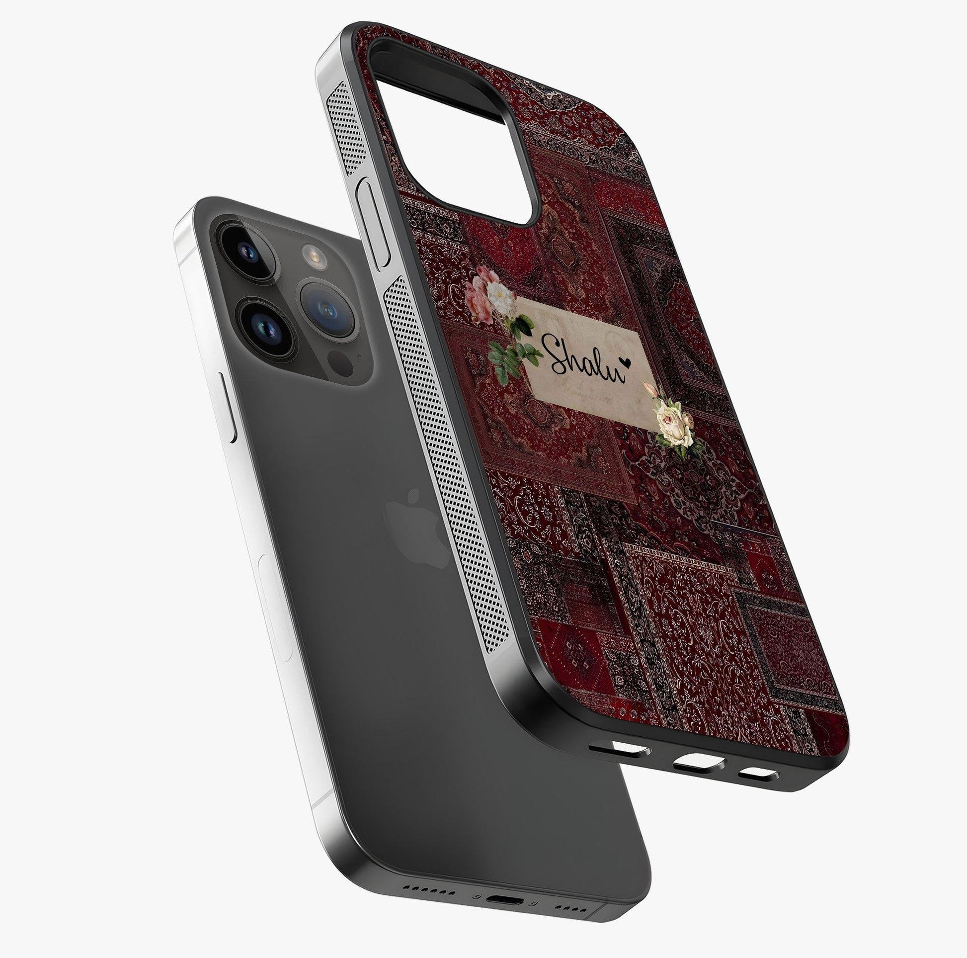 Velvet Wine Pattern Custom Name Glass Case laid diagonally highlighting side profile, edges and glossy glass shine.