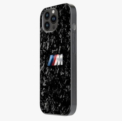 Carbon Speed Mark Glass Case photographed in natural light showing reflective finish and design depth.