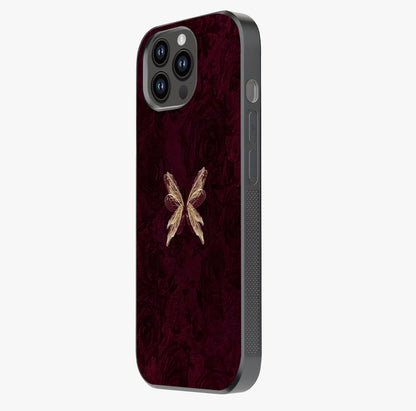 Crimson Fade Butterfly Glass Case photographed in natural light showing reflective finish and design depth.