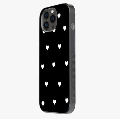 Cute And Simple White Hearts Glass Case photographed in natural light showing reflective finish and design depth.