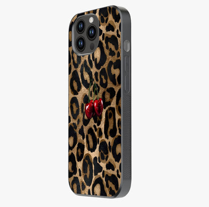 Leopard Wild Cherry Glass Case photographed in natural light showing reflective finish and design depth.