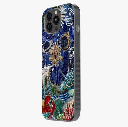 Universe Underwater Spark Glass Case photographed in natural light showing reflective finish and design depth.