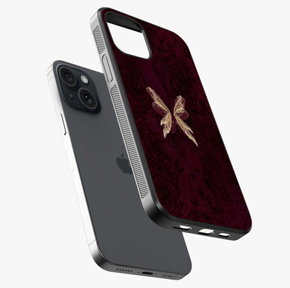 Crimson Fade Butterfly Glass Case laid diagonally highlighting side profile, edges and glossy glass shine.