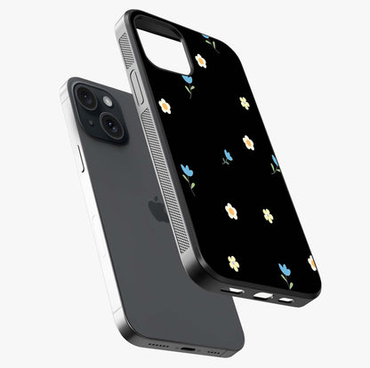 Minimalistic Blue With White Flower Pattern Glass Case laid diagonally highlighting side profile, edges and glossy glass shine.