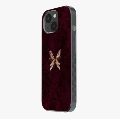 Crimson Fade Butterfly Glass Case photographed in natural light showing reflective finish and design depth.