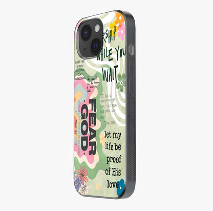 Faith Over Fear Glass Case photographed in natural light showing reflective finish and design depth.