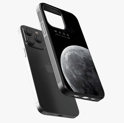 Cosmic Moon Glow Glass Case photographed in natural light showing reflective finish and design depth.