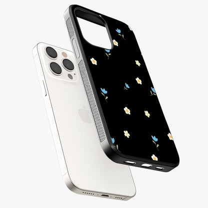 Minimalistic Blue With White Flower Pattern Glass Case laid diagonally highlighting side profile, edges and glossy glass shine.