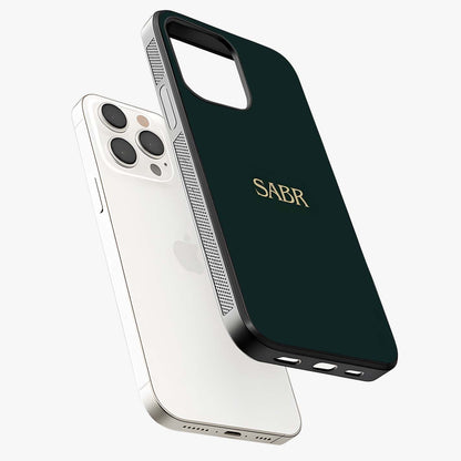 Sabr Minimal Patience Glass Case laid diagonally highlighting side profile, edges and glossy glass shine.