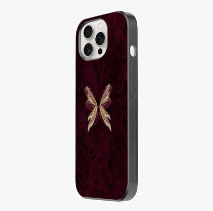 Crimson Fade Butterfly Glass Case photographed in natural light showing reflective finish and design depth.