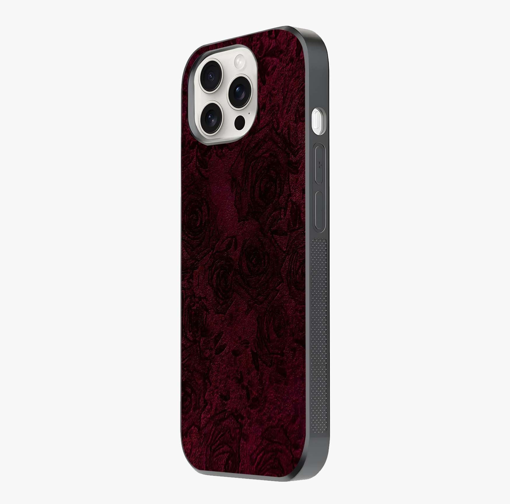 Crimson Fade Flow Glass Case photographed in natural light showing reflective finish and design depth.